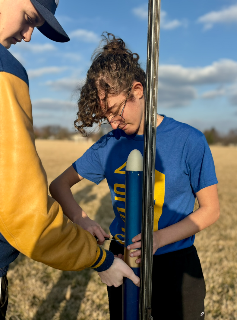 Me setting up our competition rocket