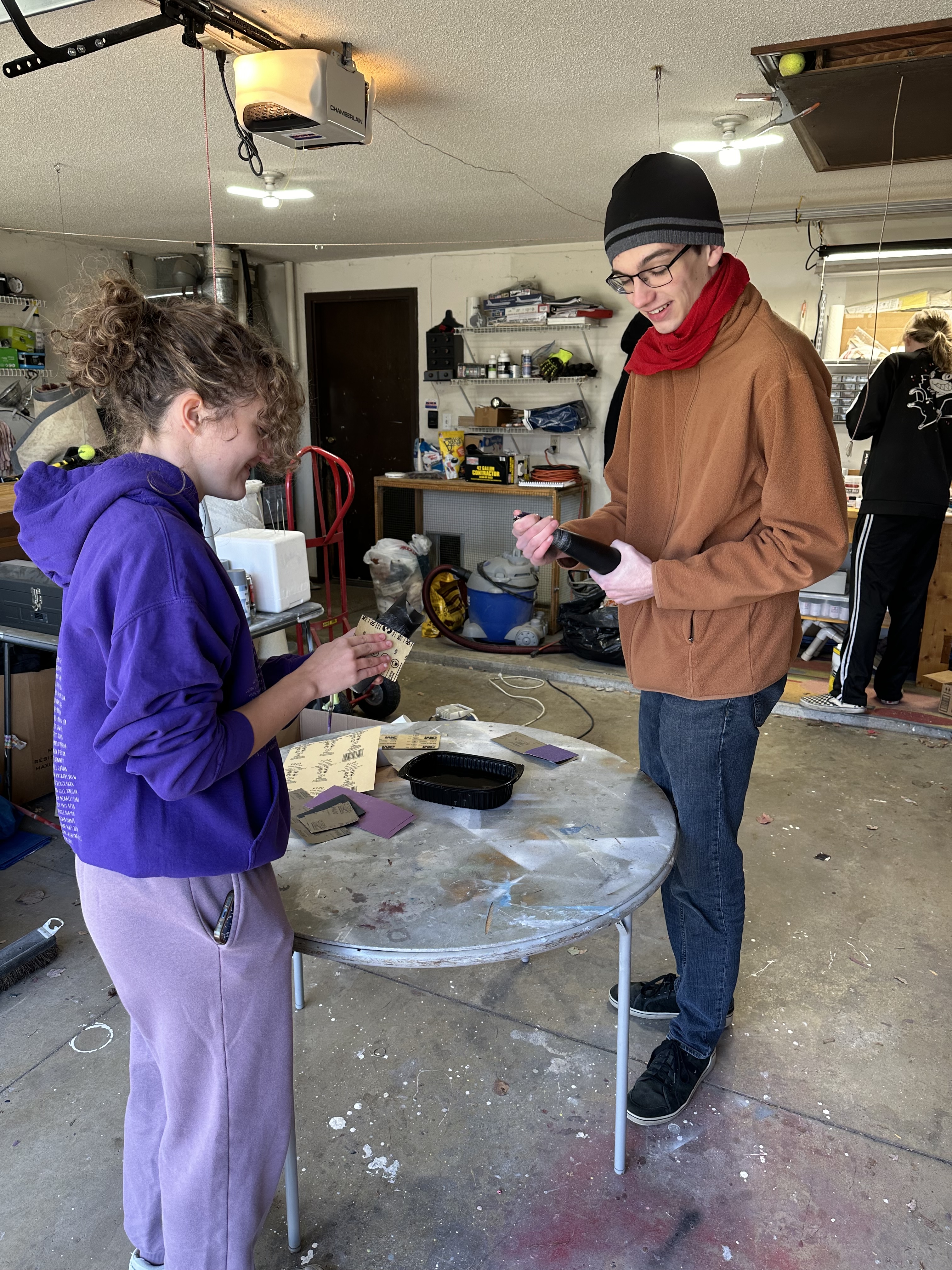 Working on sanding paint with my team