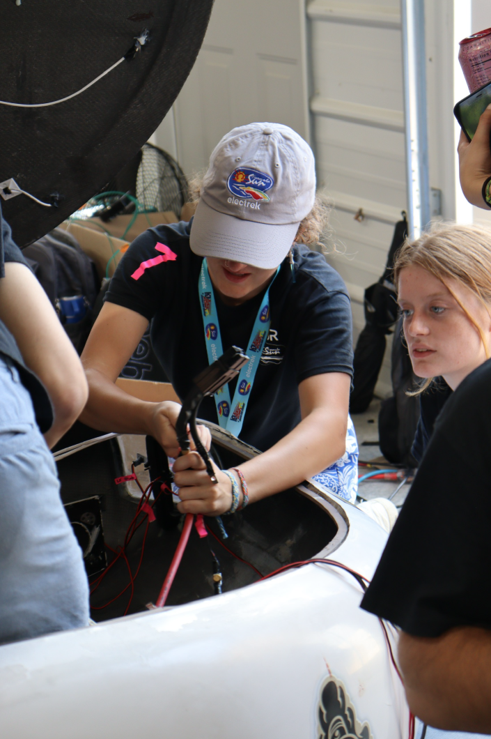 Me working on wiring in the car